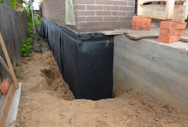 SJ Waterproofing Pros team performing specialized Waterproofing assessment in Maryland, MD